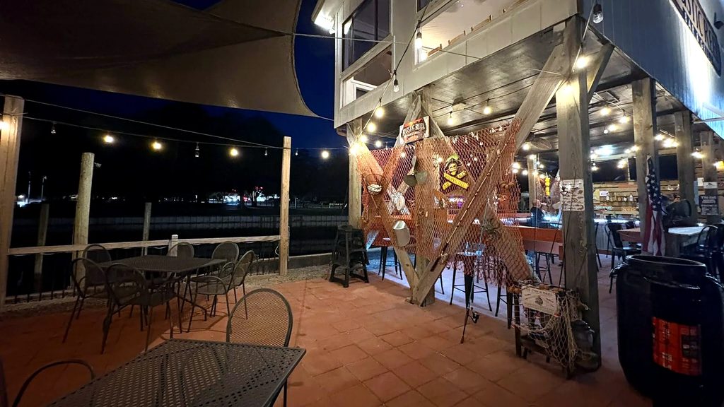 Downstairs deck at Rustic Reel at night