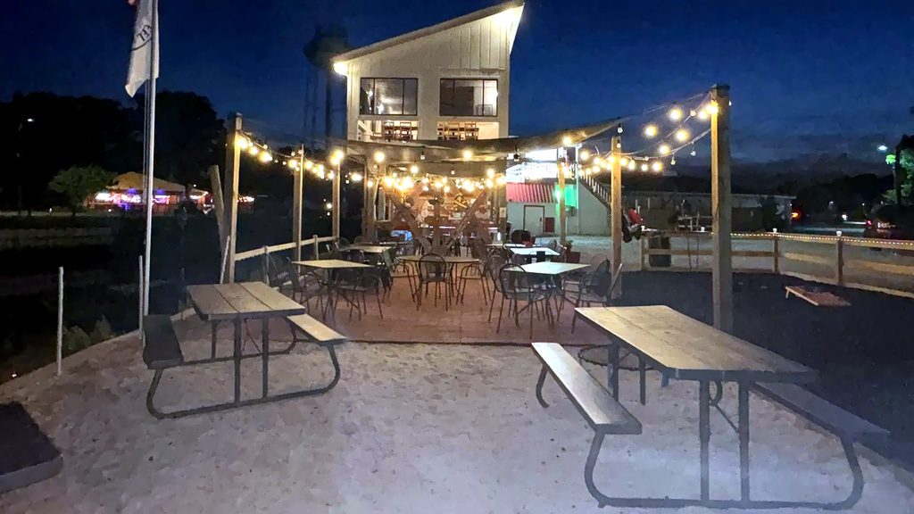 String-lit patio seating at Rustic Reel