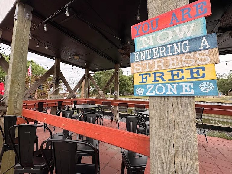 Rustic Reel outdoor patio overlooking the waterway